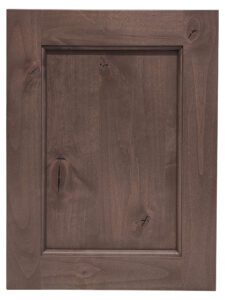 A Knotty Alder cabinet door with a medium brown stain.