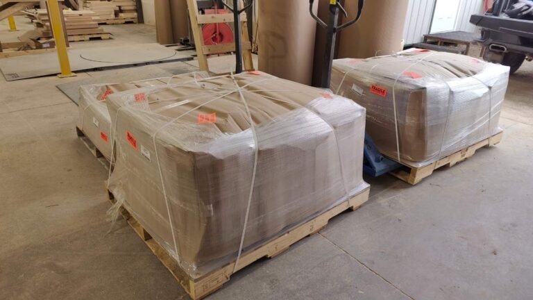 Three skids of cabinet doors packaged up and ready to ship out.