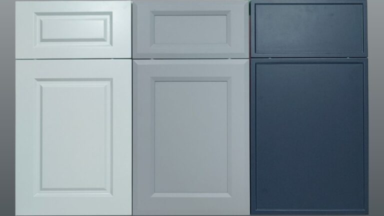 Three MDF cabinet doors on a grey background.
