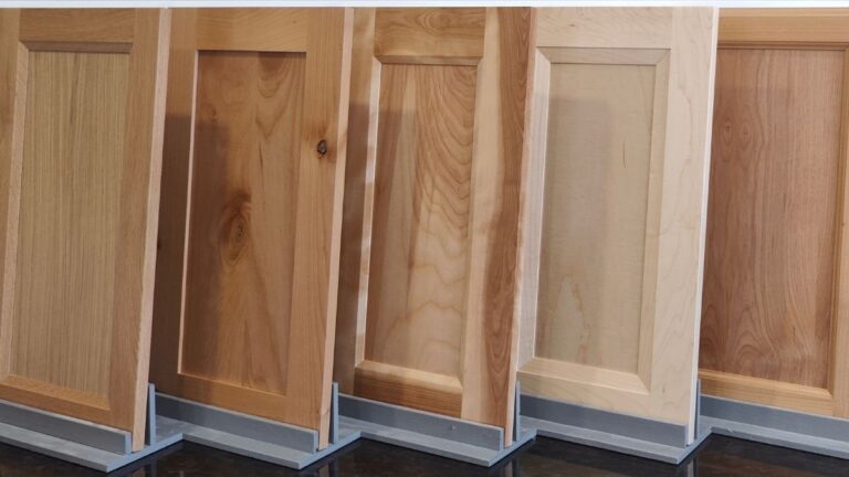 Five plywood panel shaker style cabinet doors in a variety of wood species.