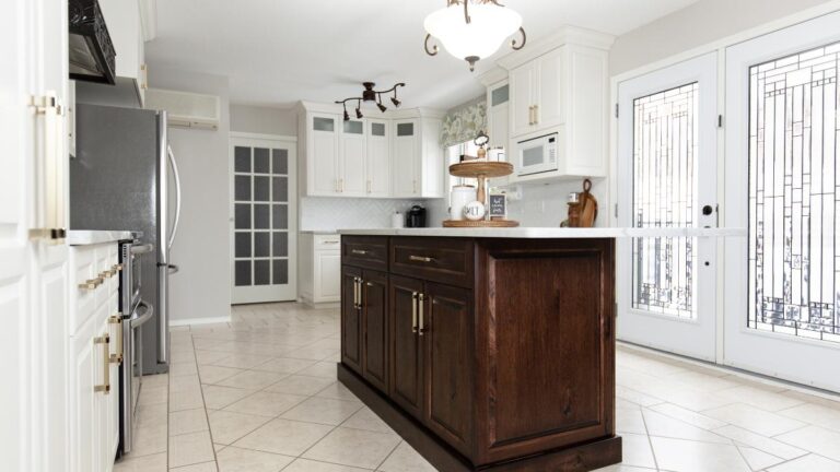 Paint-grade wood is used for painted cabinet doors, like the white painted cabinet doors around the perimeter of this kitchen.