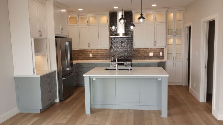 This kitchen features grey painted lowers and white painted uppers, all 1-piece MDF cabinet doors.