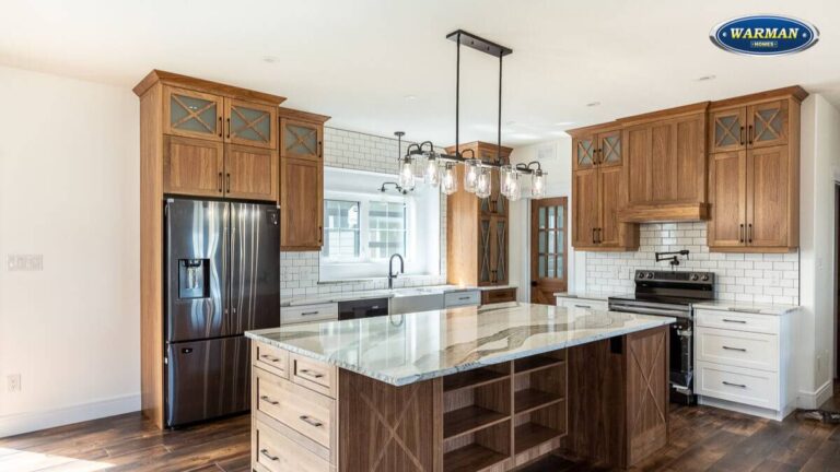 A kitchen with Hickory plywood panel cabinet doors.