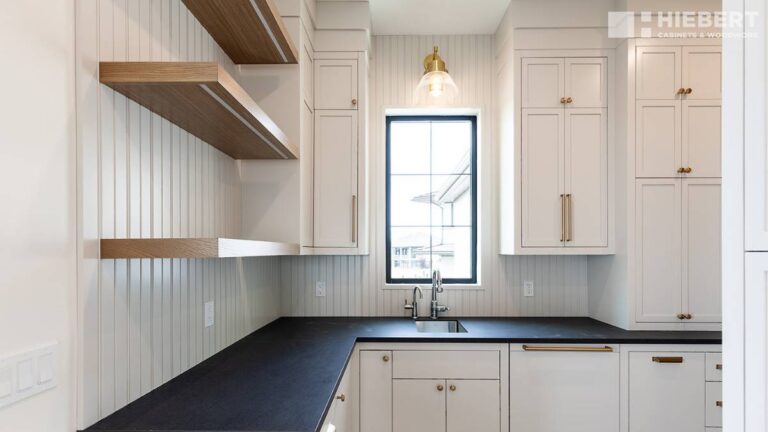 5-piece MDF doors, like the white painted doors in this pantry, are hard to tell apart from solid wood cabinet doors.