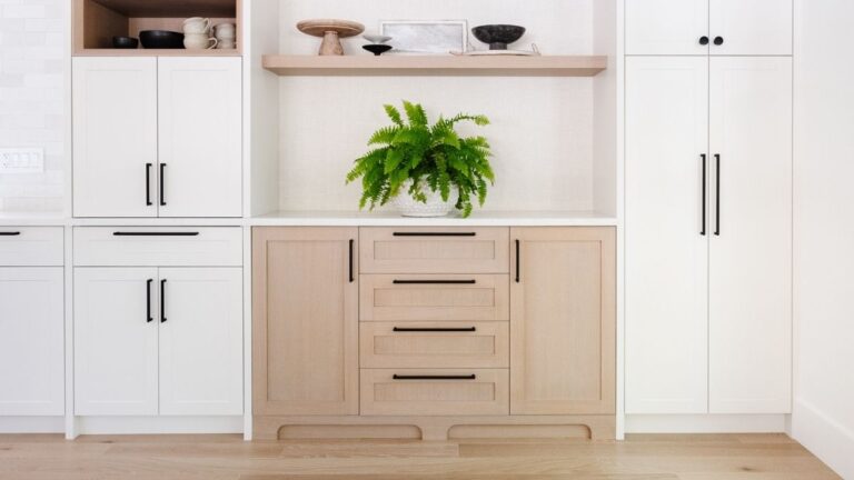 Select grade Rift Cut White Oak doors, shown here paired with white painted cabinet doors, provide a highly-consistent base for whitewash finishes.