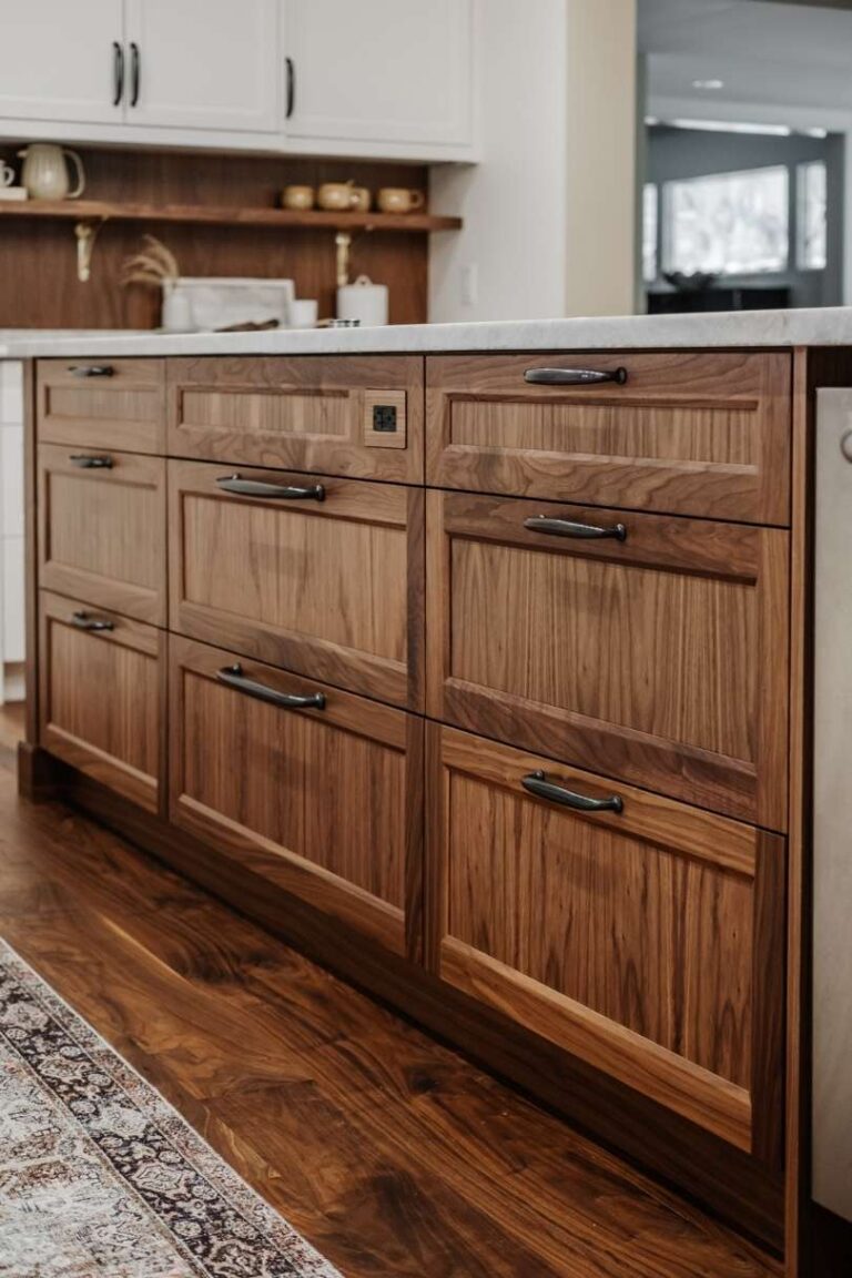 This island features Walnut 5-piece drawer fronts with vertical grain centre panels.