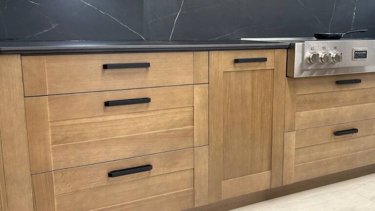 A kitchen featuring White Oak mission-style doors and drawer fronts, some five-piece and some 3-piece.