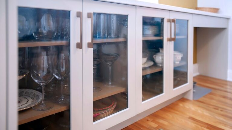 Open frames, like these white painted frames, are the most common type of glass cabinet doors.