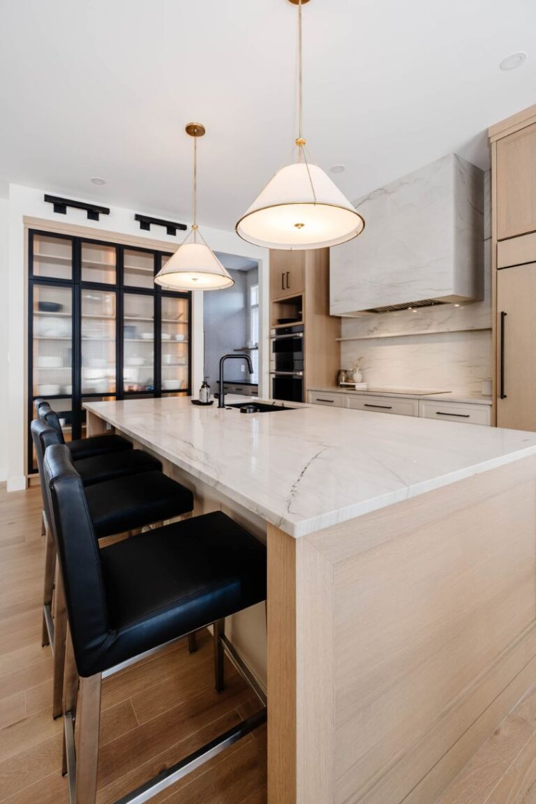 A kitchen island featuring a mitred cabinet door on the end panel.