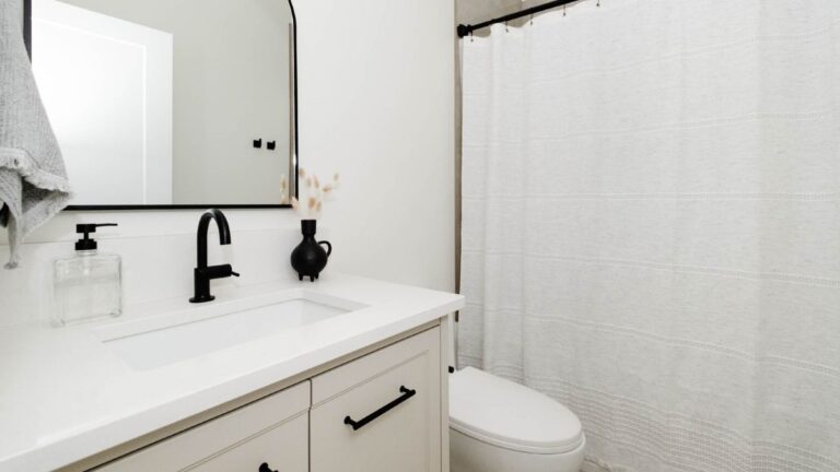 MDF cabinet doors, like the cream painted doors on this vanity, require a completely sealed painted finish.