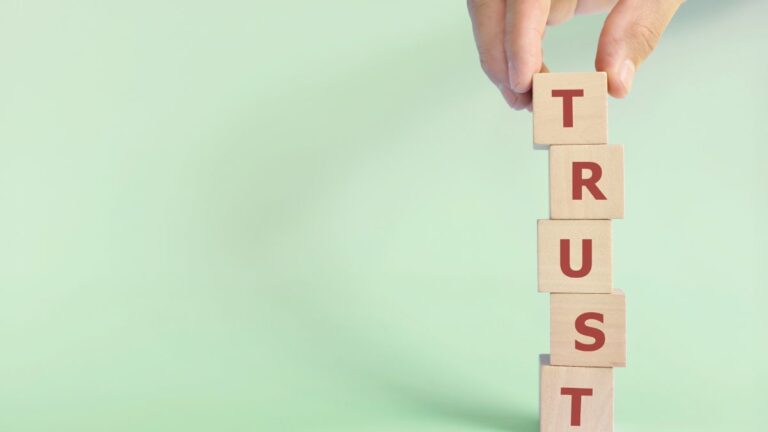 Vertically-stacked wooden blocks spelling trust. Cutting Edge Doors & Woodworking may be the cabinet door supplier for you if you want to become a trusted installer.