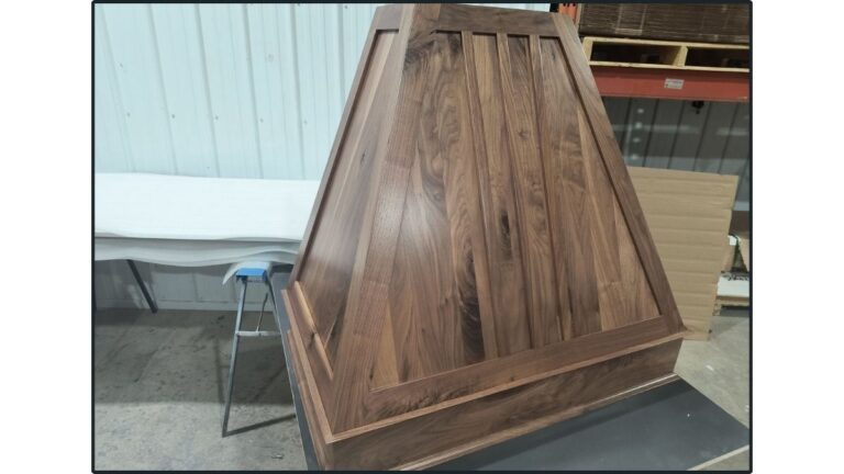 Custom finished products, like this Walnut angled range hood, take longer to produce.