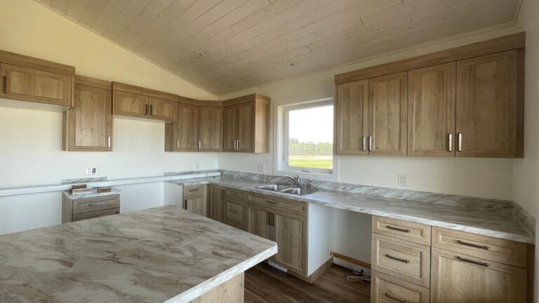 A kitchen with light-brown woodgrain NEXGEN cabinet doors. NEXGEN cabinet doors from Cutting Edge typically ship with 8-10 working days.