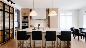 A kitchen with Rift Cut White Oak cabinet doors. Chris Murray Custom Cabinets works with homeowners in Regina.