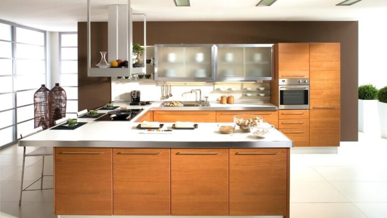 Custom solid wood slab cabinet doors, like the grain matched slabs in this kitchen, may take longer to make.